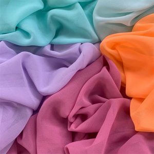 PASTEL COLOURED SHEER CHIFFON DRAPED NEXT TO EACH OTHER