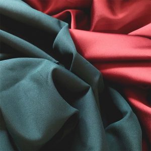 GREEN AND RED SATIN IN A DRAPED DISPLAY