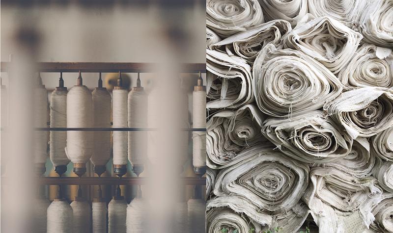 Yarn cones and loom state fabric on rolls.