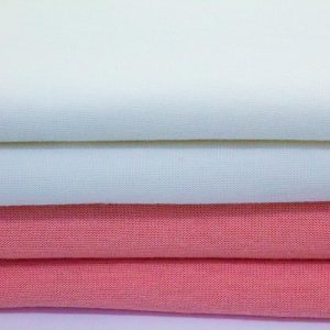A PINK AND WHITE FABRIC, FOLDED DOUBLE ARE DISPLAYED HORIZONTALLY.