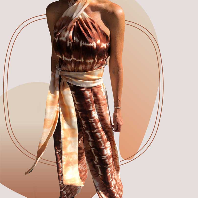 Model wearing chocolate and natural colour tie dye jumpsuit.